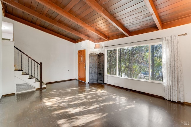 unfurnished living room featuring wood ceiling, stairs, baseboards, and beamed ceiling