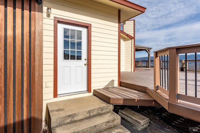 doorway to property featuring a deck