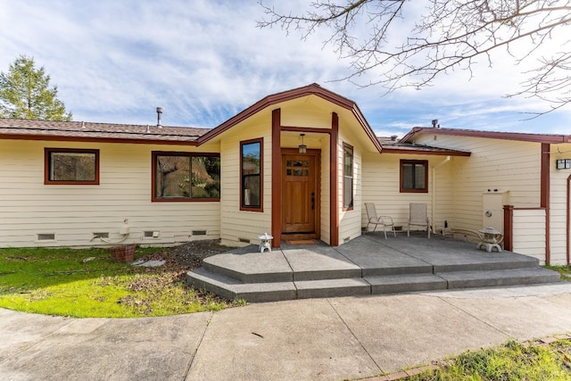 view of front of house featuring a patio