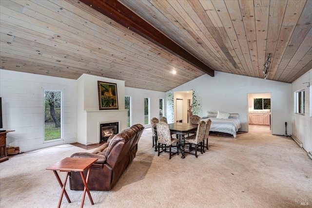 living room with wooden ceiling, light carpet, and lofted ceiling with beams