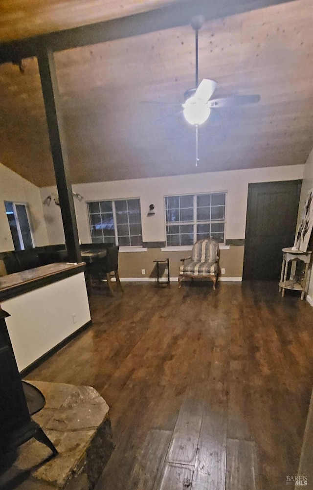 living room with ceiling fan and hardwood / wood-style floors