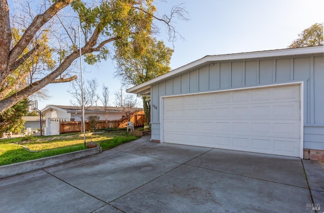 garage with a lawn