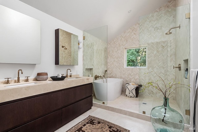 bathroom featuring tile patterned flooring, plus walk in shower, and vanity