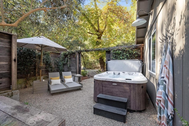 view of patio featuring a hot tub