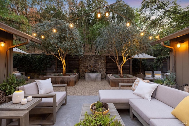 patio terrace at dusk with outdoor lounge area