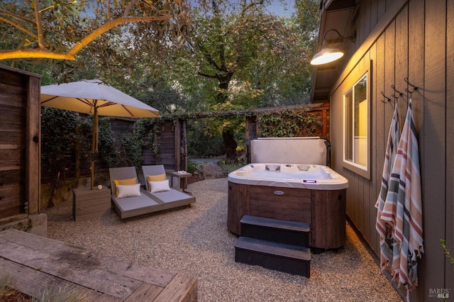 view of patio with a hot tub