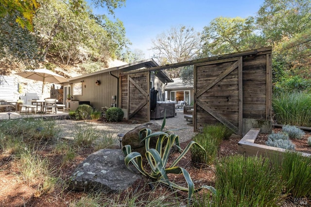 rear view of house featuring a patio area