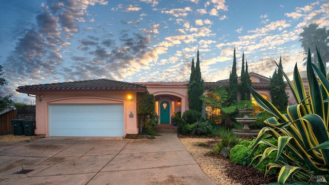 view of front of home with a garage