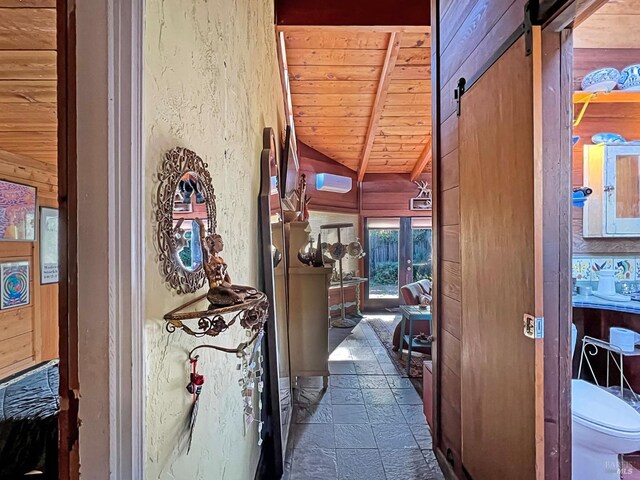 bathroom with a textured wall, tile patterned flooring, wood ceiling, and shower / tub combo with curtain