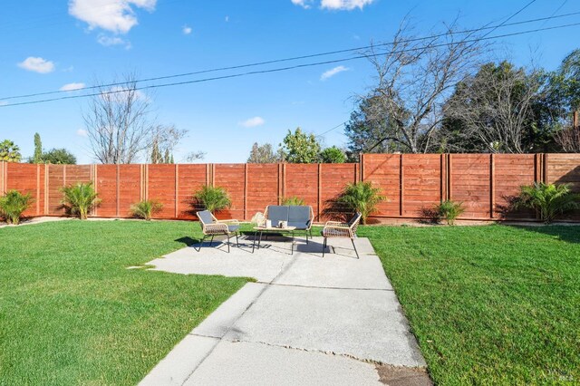 view of yard with an outdoor hangout area and a patio area