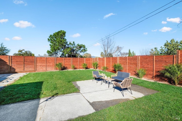 view of yard featuring a patio and a fenced backyard