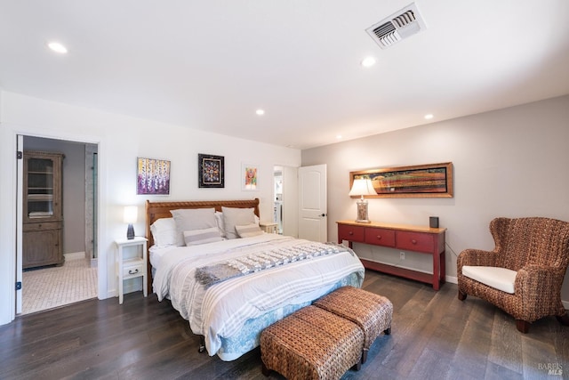 bedroom featuring dark hardwood / wood-style floors