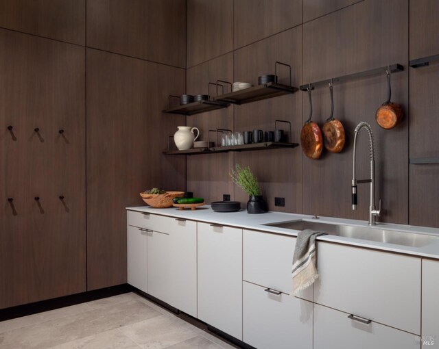 kitchen with sink and black double oven