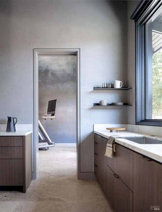 kitchen with white cabinets and sink