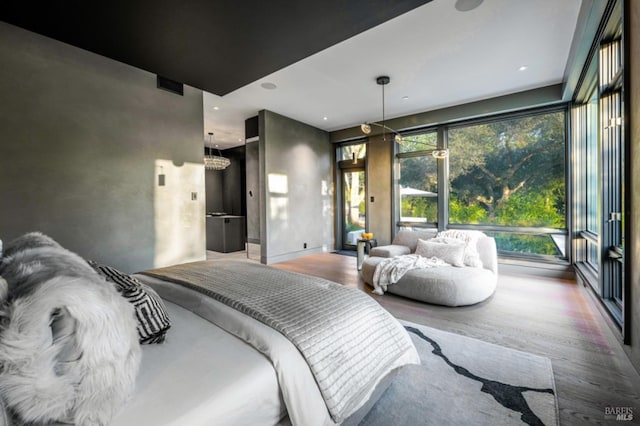 bedroom featuring hardwood / wood-style flooring