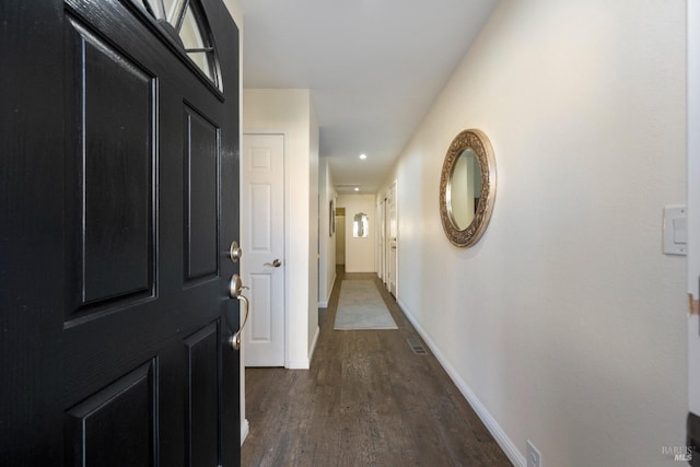 hall featuring dark hardwood / wood-style floors