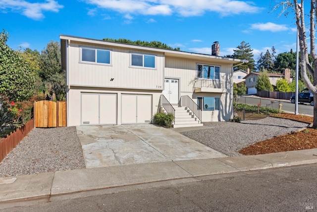 split foyer home featuring a garage