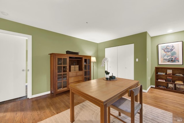 dining space featuring hardwood / wood-style floors