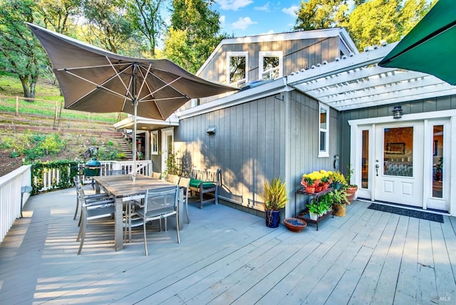 wooden deck with a pergola