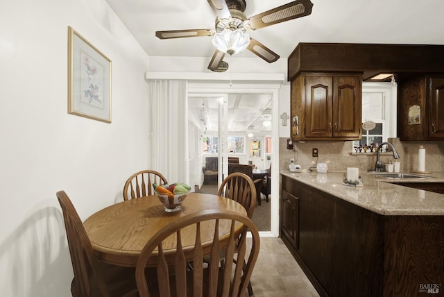 dining room featuring a ceiling fan