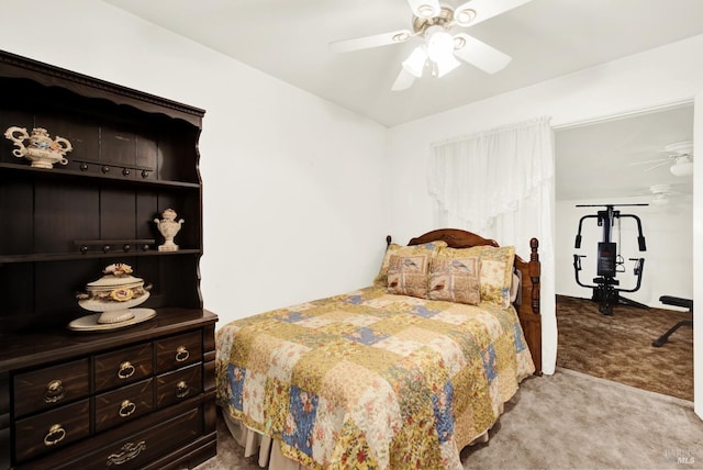 bedroom with light carpet and ceiling fan