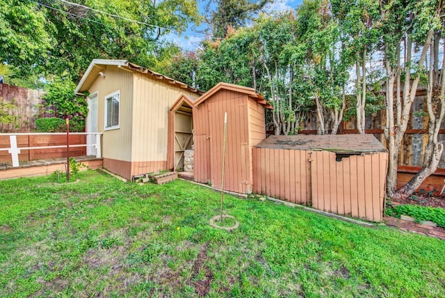 view of shed featuring a fenced backyard