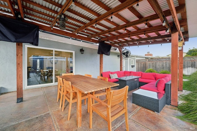 view of patio featuring ceiling fan and an outdoor living space