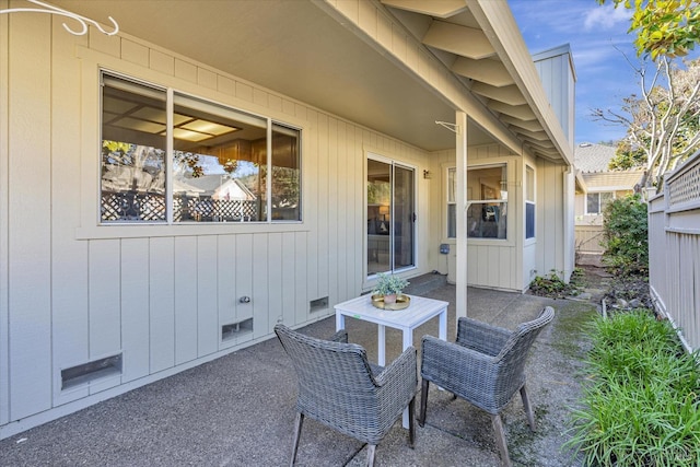 view of patio / terrace featuring fence