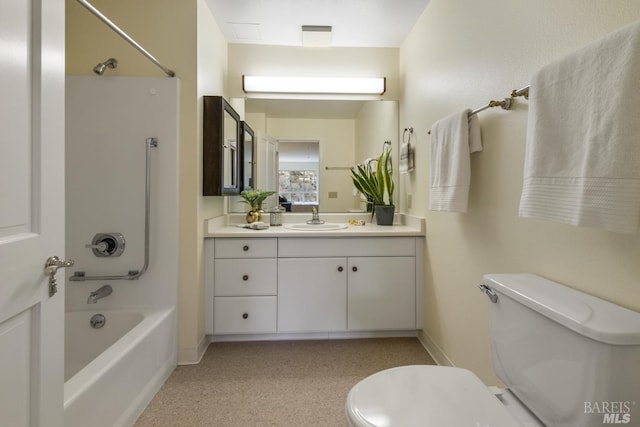 full bathroom featuring toilet, shower / bathing tub combination, and vanity