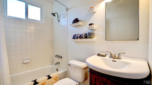 full bathroom with toilet, shower / tub combo with curtain, and vanity