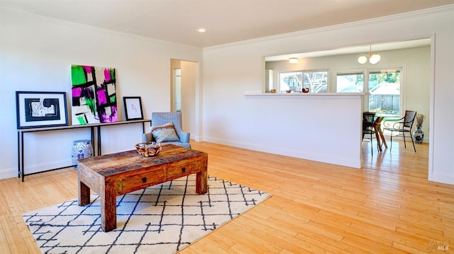 office area featuring light hardwood / wood-style flooring and crown molding