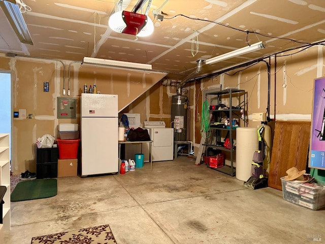 below grade area with a garage, secured water heater, freestanding refrigerator, electric panel, and washer / clothes dryer