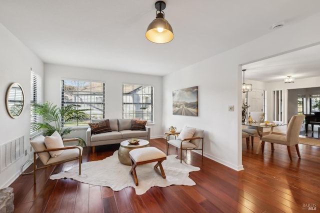 living room featuring dark hardwood / wood-style floors