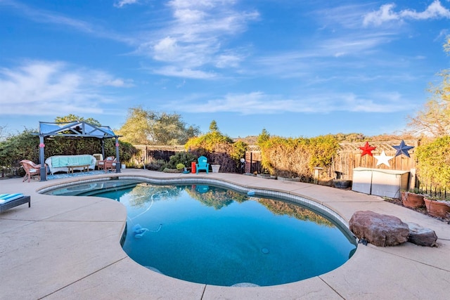 view of swimming pool with a fenced backyard, an outdoor living space, a fenced in pool, and a patio