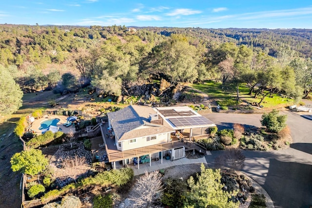 bird's eye view featuring a view of trees