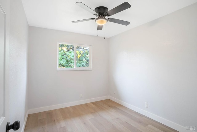 unfurnished room with ceiling fan and light hardwood / wood-style floors