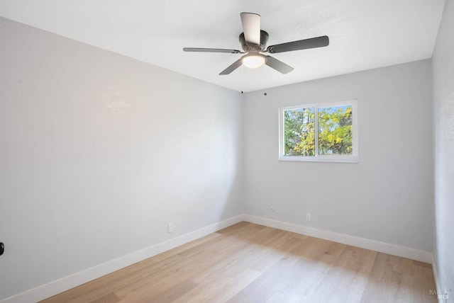 unfurnished room featuring ceiling fan and light hardwood / wood-style flooring