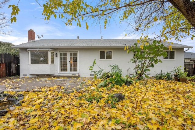 back of property featuring a patio and french doors