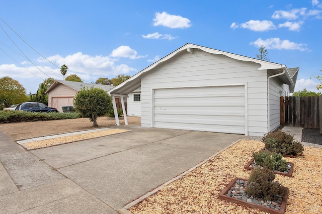 ranch-style house featuring a garage