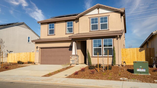 front facade with a garage