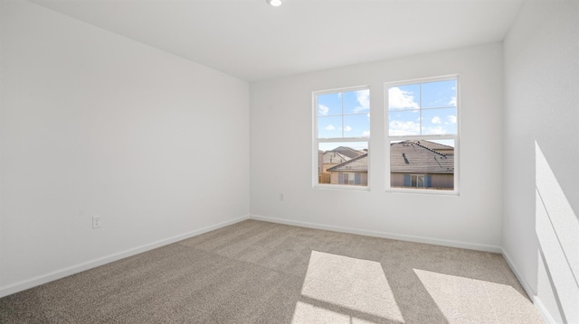 view of carpeted spare room