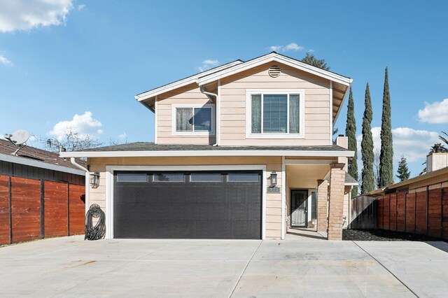 view of property featuring a garage