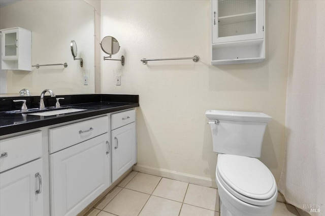 1201 Glen Cove Pkwy Unit 1514, Vallejo, CA 94591 - bathroom with vanity, toilet, tile patterned floors, and baseboards