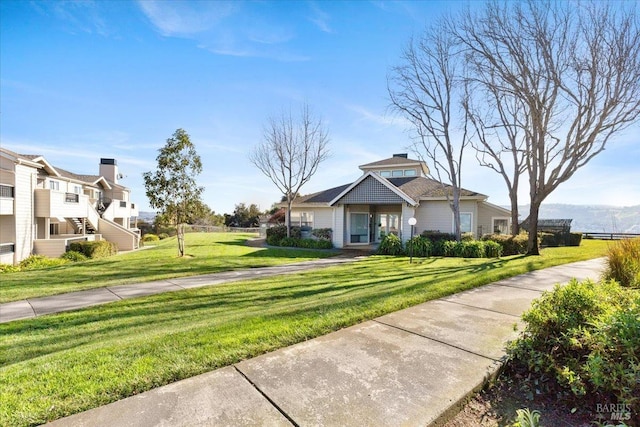 view of front facade with a front lawn