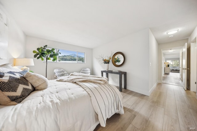 bedroom featuring light hardwood / wood-style flooring