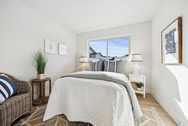 bedroom featuring light wood-type flooring