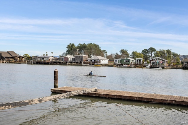 dock area featuring a water view