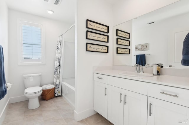 full bathroom featuring toilet, shower / bath combo with shower curtain, tile patterned floors, and vanity