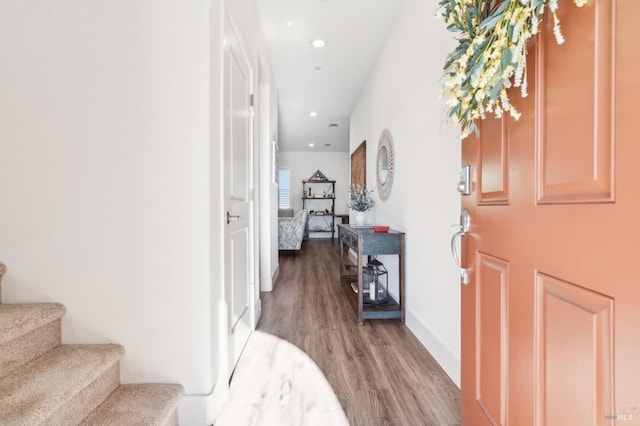 hall with light hardwood / wood-style floors