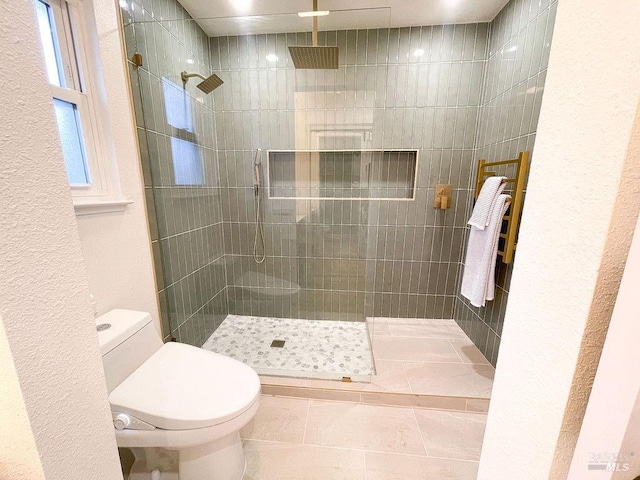 2425 Creekside Ave, Napa, CA 94558 - full bathroom featuring toilet, a tile shower, tile patterned floors, and a textured wall